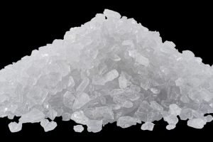 Pile,Of,Salt,Crystals,Isolated,On,A,Black,Background.,File